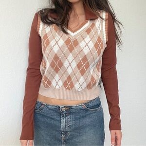 Say What Tan Orange and white argyle sweater vest. Size L.